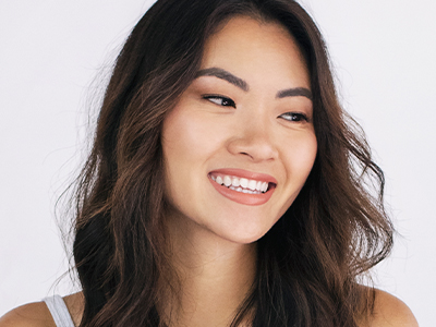 Beautiful woman smiling looking to the left
